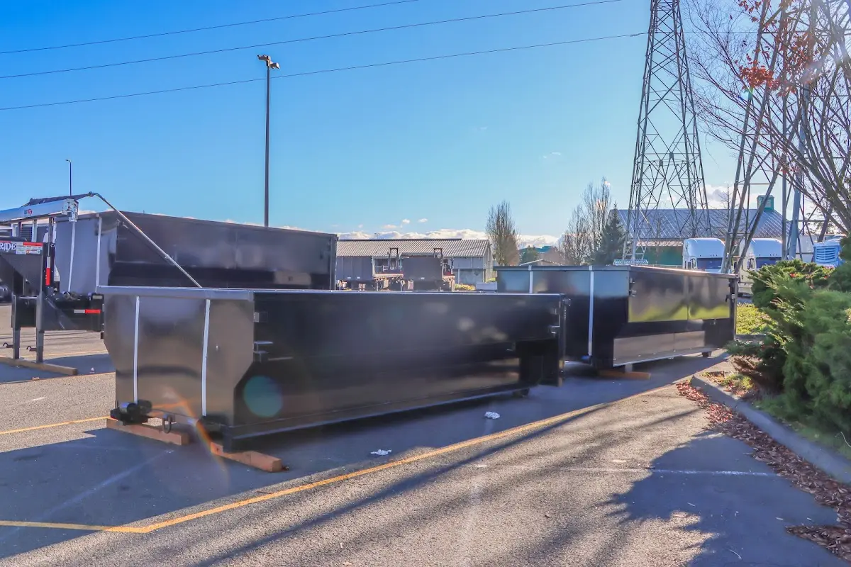 Roll-off dumpster ready for waste disposal at job site for 12 Yard Dumpster Rental in Missoula